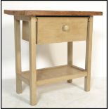 A rustic country limed pine side / occasional table, constructed with square supports united by