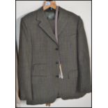 A vintage mid 20th Century Dunn and Co gentleman's tweed / check two piece suit in fantastic