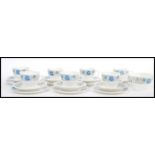 A 20th Century Wedgwood bone china part tea service in the Clementine pattern, having blue floral