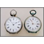 Two 19th century small ladies silver pocket fob watches both having white enamel faces with Roman
