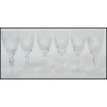 A set of 6 Edinburgh crystal cut glass wine glass having single stems with circular bases and