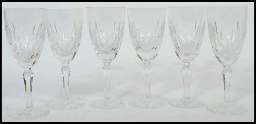 A set of 6 Edinburgh crystal cut glass wine glass having single stems with circular bases and