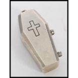 A sterling silver 925 pill box pendant in the form of a coffin with hinged lid and cross crucifix