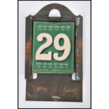 A vintage early 20th century French desk calendar having notation reading Time is the soul of