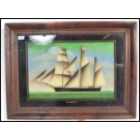 An early 20th century reverse painting on glass depicting a sailing ship clipper boat entitled '