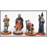 A collection of Royal Doulton porcelain figurines to include Good King Wenceslas HN2118, The