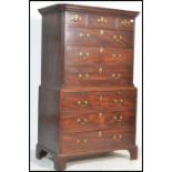 A 19th century Georgian bachelors mahogany chest on chest of drawers - tallboy. Raised on shaped
