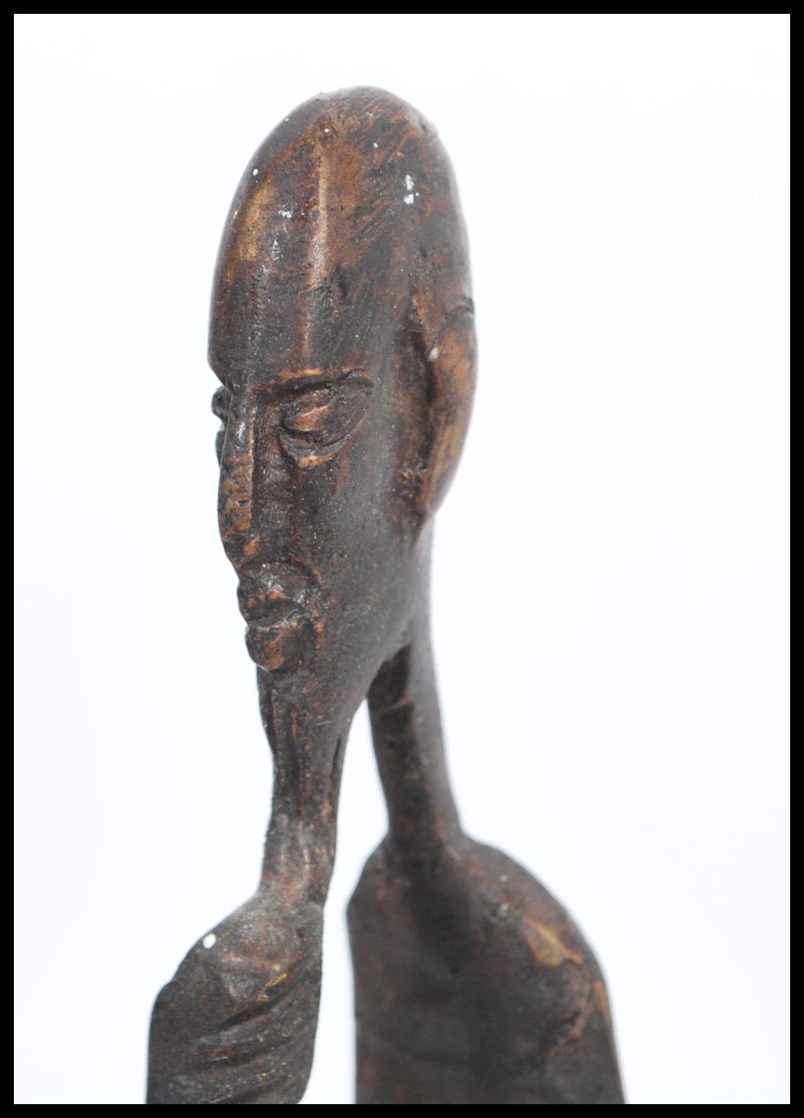 A group of three vintage 20th century bronze African figures / statues to include a candlestick - Image 3 of 7