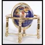 A vintage style lapis lazuli desk top globe having