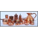 A good collection of brass and copper wares dating from the 19th Century to include chocolate pot,
