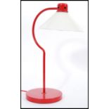 A vintage retro 20th Century red desk lamp, possibly by Terence Conran for Habitat, circular base