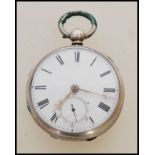 A 19th century Victorian silver hallmarked pocket watch having a fusee movement. The white enamel