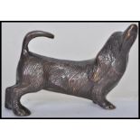 An early 20th century bronze statue figurine of a dachshund sausage dog modelled on all fours with