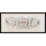 A Mappin and Webb 18ct white gold and diamond art deco style ring set with a central rectangular