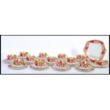 An early 20th century Royal Albert chintz roses pattern tea service. Gilded borders having