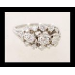 A fantastic 18ct white gold thirteen stone diamond