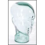 A vintage retro 20th century advertising shop display glass phrenology type head of clear glass