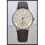 A vintage 1930's Omega gentleman's jumbo oversized watch circa WWII, having a round face in a