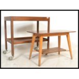 A retro Danish inspired mid century teak wood butl