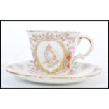 A 19th Century Victorian cupboard display commemorative cup and saucer for the diamond jubilee