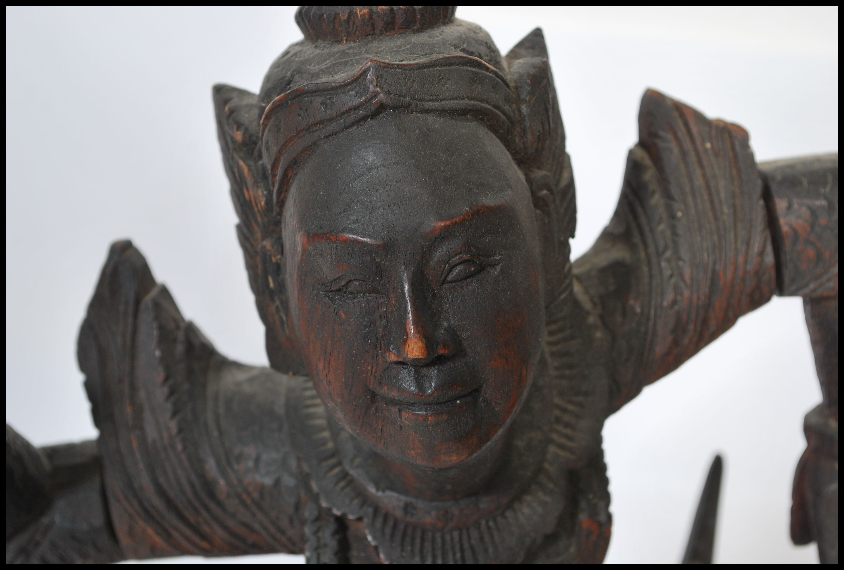 A pair of early 20th century Chinese / Asiatic wooden hand carved figurines of Buddhas / deities - Image 2 of 4