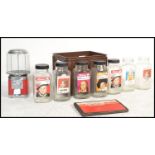 A collection of retro shop display sweet jars ( seven ) complete in transportation case, each jar