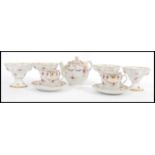 A set of 4 19th century KPM Dresden porcelain sorbet dishes with chintz pattern having gilt swag
