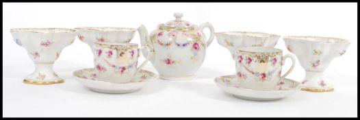 A set of 4 19th century KPM Dresden porcelain sorbet dishes with chintz pattern having gilt swag