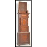 A 19th century mahogany clock body with a panelled door and moulded detailing. Measures: 218cm