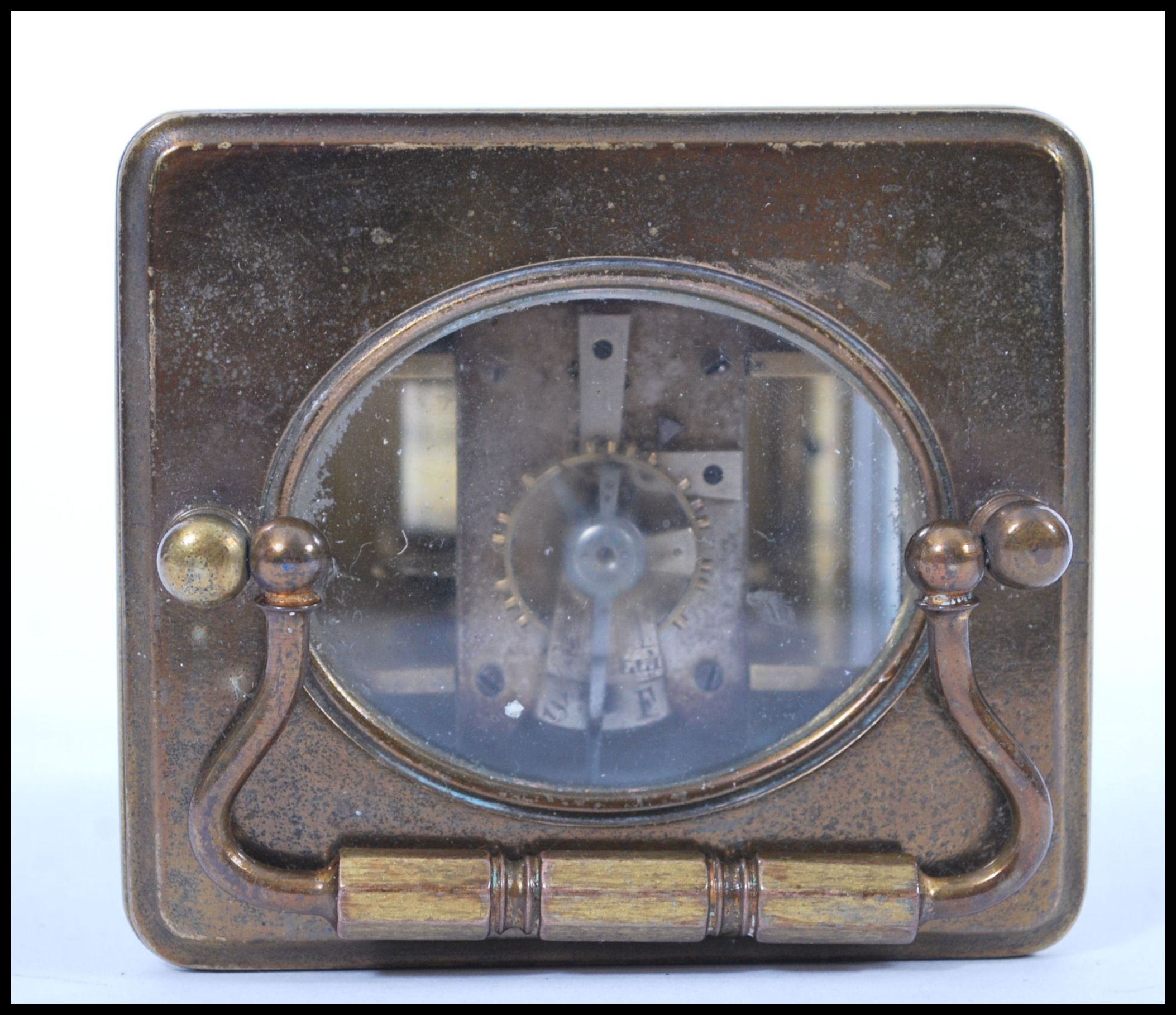 An early 20th Century brass bound carriage clock having roman numerals to the chapter ring and - Image 4 of 4