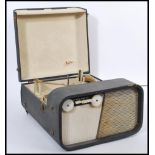 A vintage 20th Century four speed Philco portable record player, hinged lid with carry handle to the
