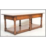 A 20th Century oak peg jointed coffee table in a Jacobean revival style, rectangular top raised on