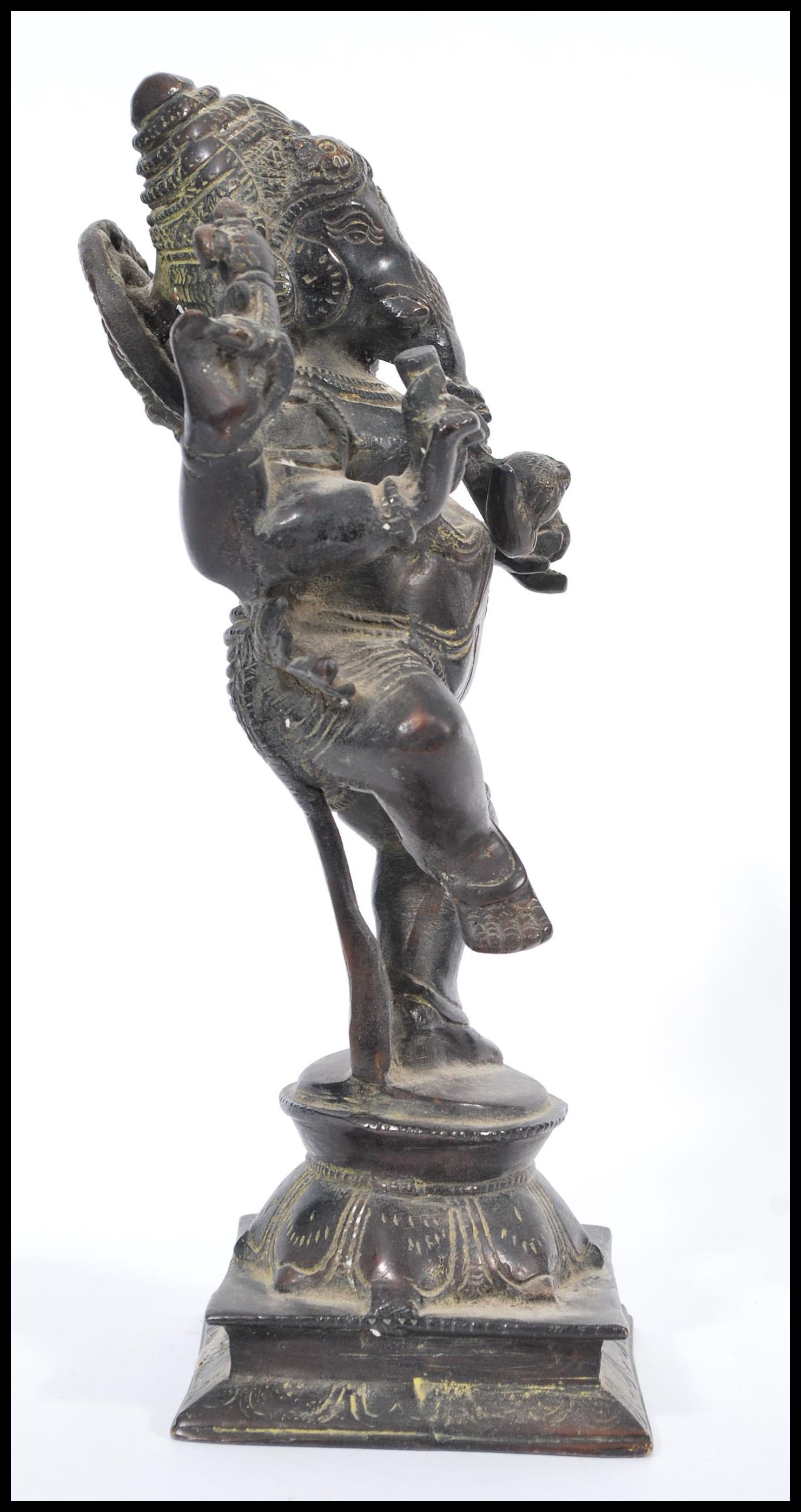 An early 20th century Indian bronze statue of the Hindu God Ganesha raised on square pedestal base - Image 3 of 5