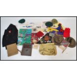 A stunning collection of vintage scout relating items to include hats,banners,badges etc together