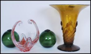 A small collection of retro 20th Century studio glass to include a tall flared vase set on a