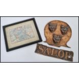 An early 20th Century embossed copper sign for Shropshire reading Salop with three lions above along