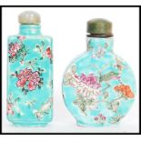 A near pair of 19th century Chinese turquoise snuff / perfume bottles one of moon flask shape and