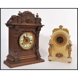An early 20th Century American Ansonia Clock Company of New York oak two train architectural
