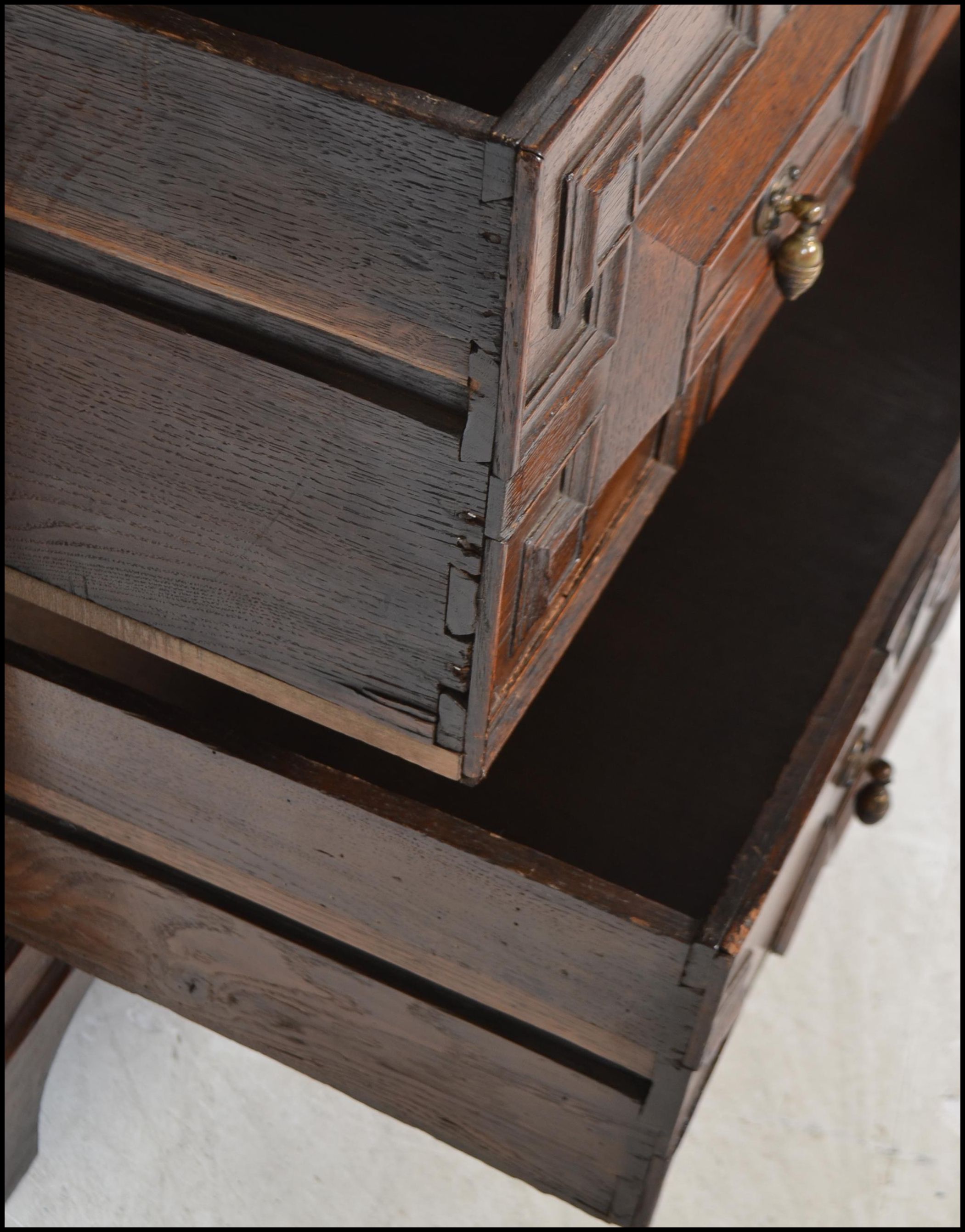 A 17th century Commonwealth oak block fronted chest of drawers. The bank of four drawers having - Image 14 of 16