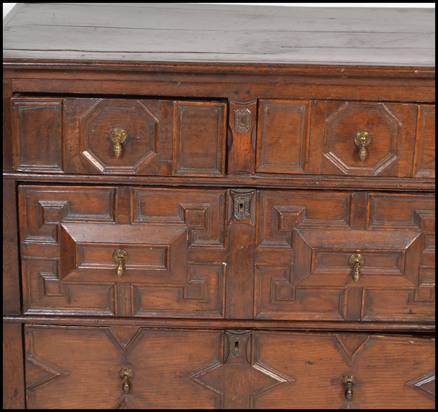 A 17th century Commonwealth oak block fronted chest of drawers. The bank of four drawers having - Image 11 of 16