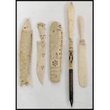 A 19th century collection of bone folding carved letter openers to include one in the form of a