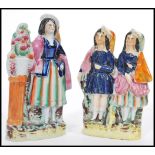 A pair of 19th century Victorianÿ Staffordshire flatback figurines. One depicting maiden next to