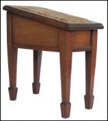 An Edwardian mahogany inlaid shoe shine box - stand. Raised on square tapering legs with spade feet.