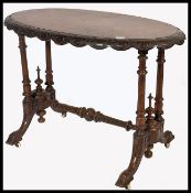 A 19th century High Victorian mahogany and marquetry inlaid ladies writing table desk. Raised on