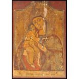 A 19th century painted wooden religious icon - ikon depicting Mary & Jesus Christ. The red ground to