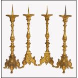 A fantastic set of four large late 19th century Victorianÿ ormolu bronze candlesticks raised on