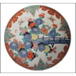 A large 19th century Chinese Famille Rose polychrome Charger. Painted with grasshopper's and