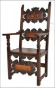 A circa 17th century Italian walnut and marquetry inlaid armchair. The chair being raised on block