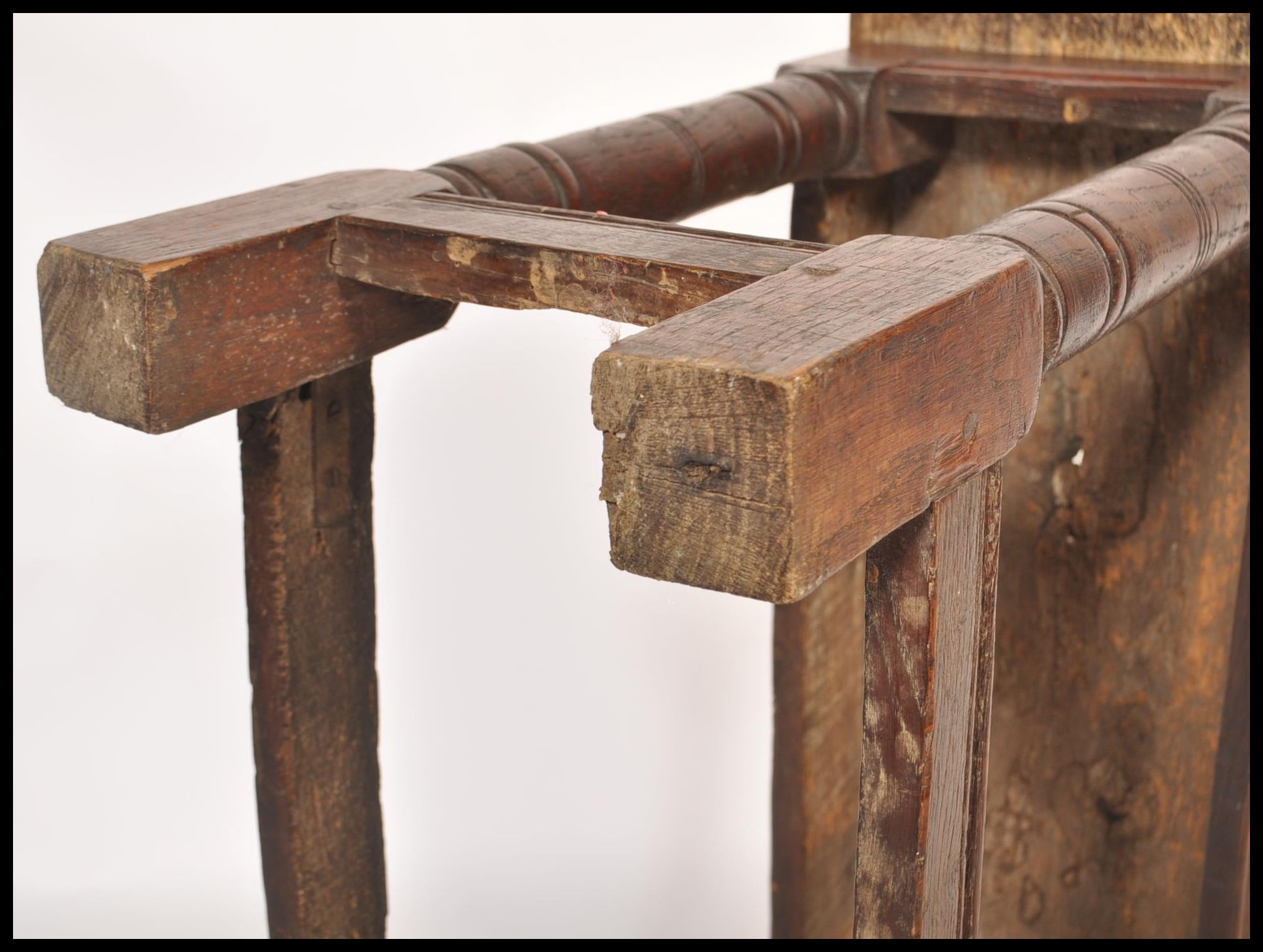 A 17th / 18th century country elm and oak joint stool. Unusual larger size with planked top over - Image 15 of 16