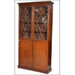 A fine 18th / 19th century George 3rd library solid mahogany bookcase cabinet. Raised on a plinth